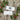 Gift voucher on a wooden surface with holly leaves and berries
